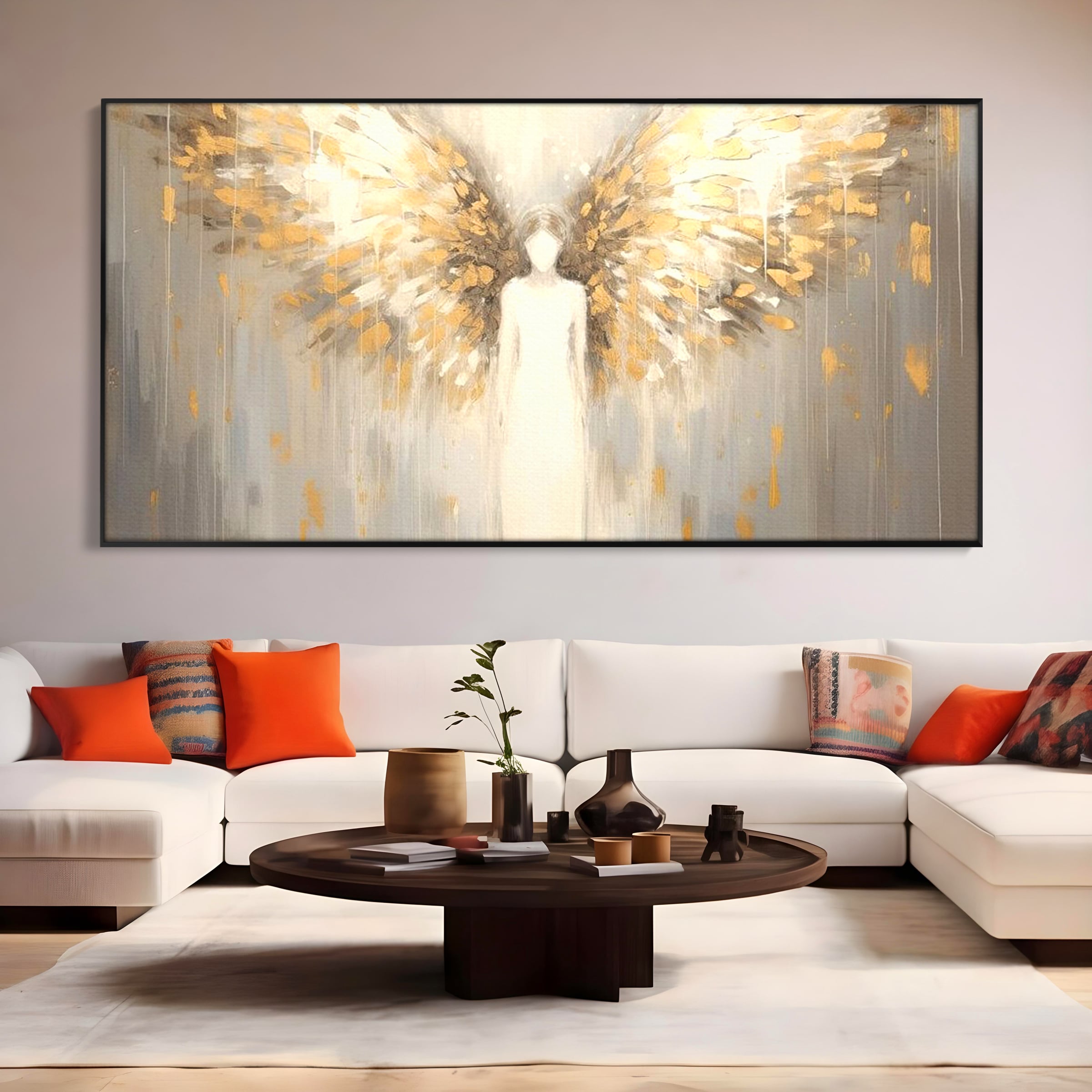 Tablou canvas cu tablou canvas cu inger si aripi aurite, in rama de aluminiu negru, pe perete intr-un living