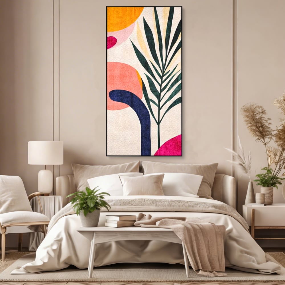 Tablou canvas cu ilustratie abstracta cu frunze de palmier, in rama de aluminiu negru, pe perete intr-un dormitor