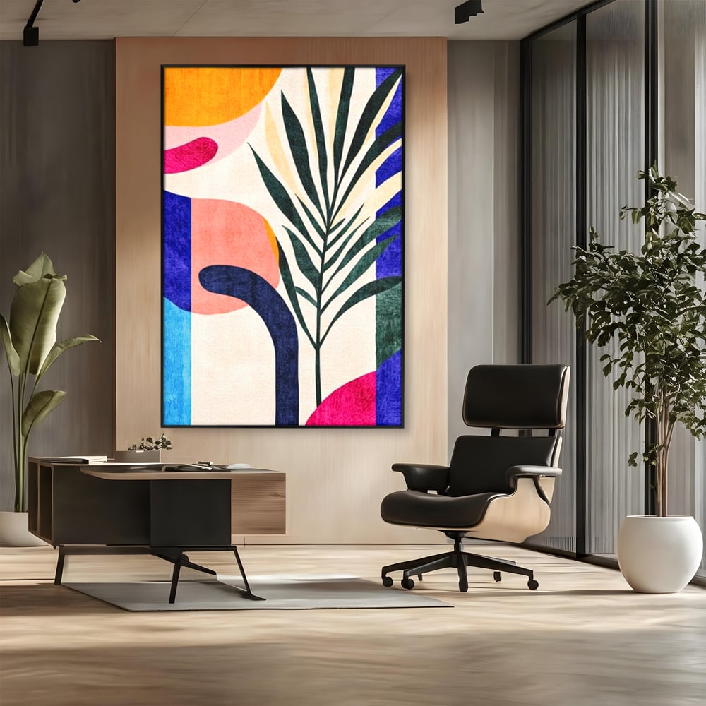 Tablou canvas cu ilustratie abstracta cu frunze de palmier, in rama de aluminiu negru, pe perete intr-un birou