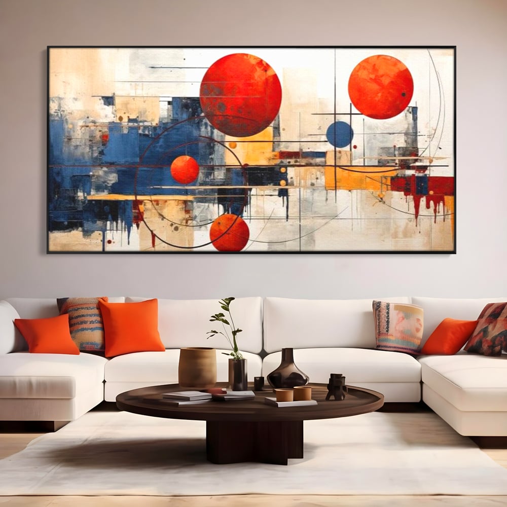 Tablou canvas cu pictura abstracta cu sfere rosii si orbite, in rama de aluminiu negru, pe perete intr-un living