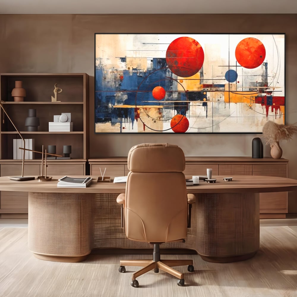Tablou canvas cu pictura abstracta cu sfere rosii si orbite, in rama de aluminiu negru, pe perete intr-un birou