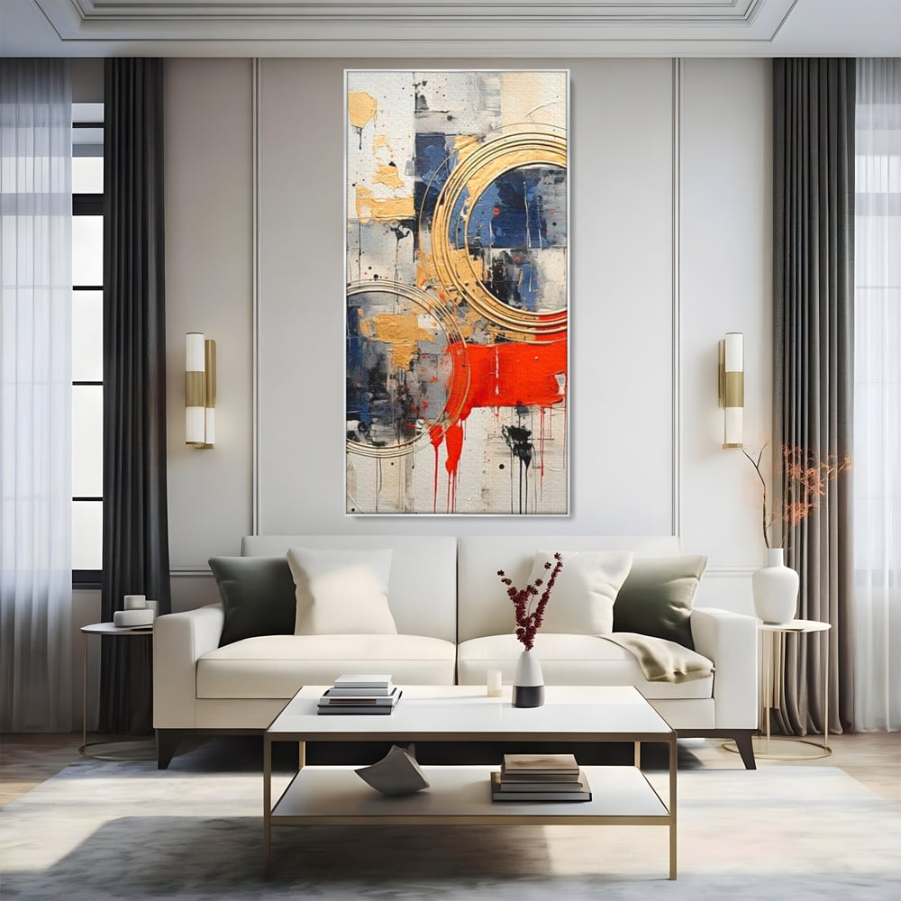 Tablou canvas cu tablou abstract cu cercuri aurii si tuse rosu aprins, in rama de aluminiu argintiu, pe perete intr-un living