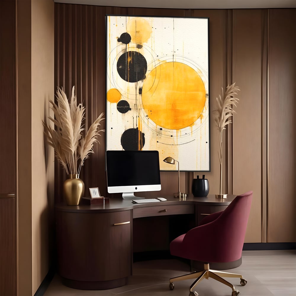 Tablou canvas cu tablou canvas cu cercuri galbene si negre, in rama de aluminiu negru, pe perete intr-un birou