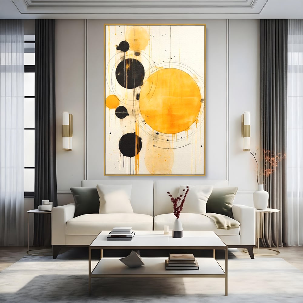 Tablou canvas cu tablou canvas cu cercuri galbene si negre, in rama de aluminiu auriu, pe perete intr-un living