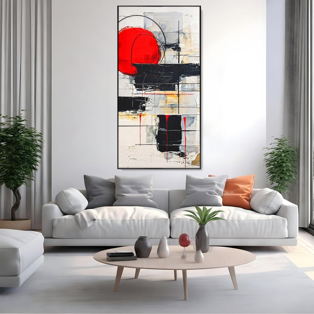 Tablou canvas cu tablou abstract cu cerc rosu si linii negre, in rama de aluminiu negru, pe perete intr-un living