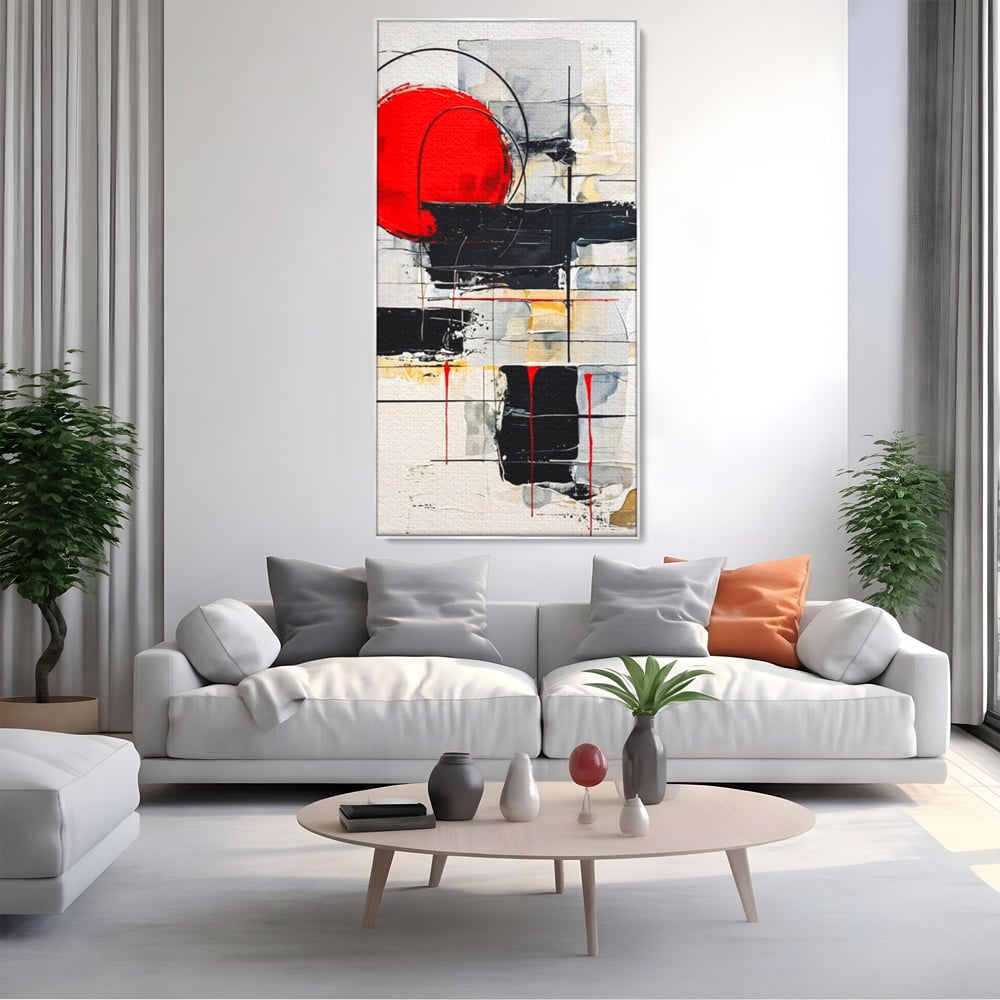 Tablou canvas cu tablou abstract cu cerc rosu si linii negre, in rama de aluminiu argintiu, pe perete intr-un living