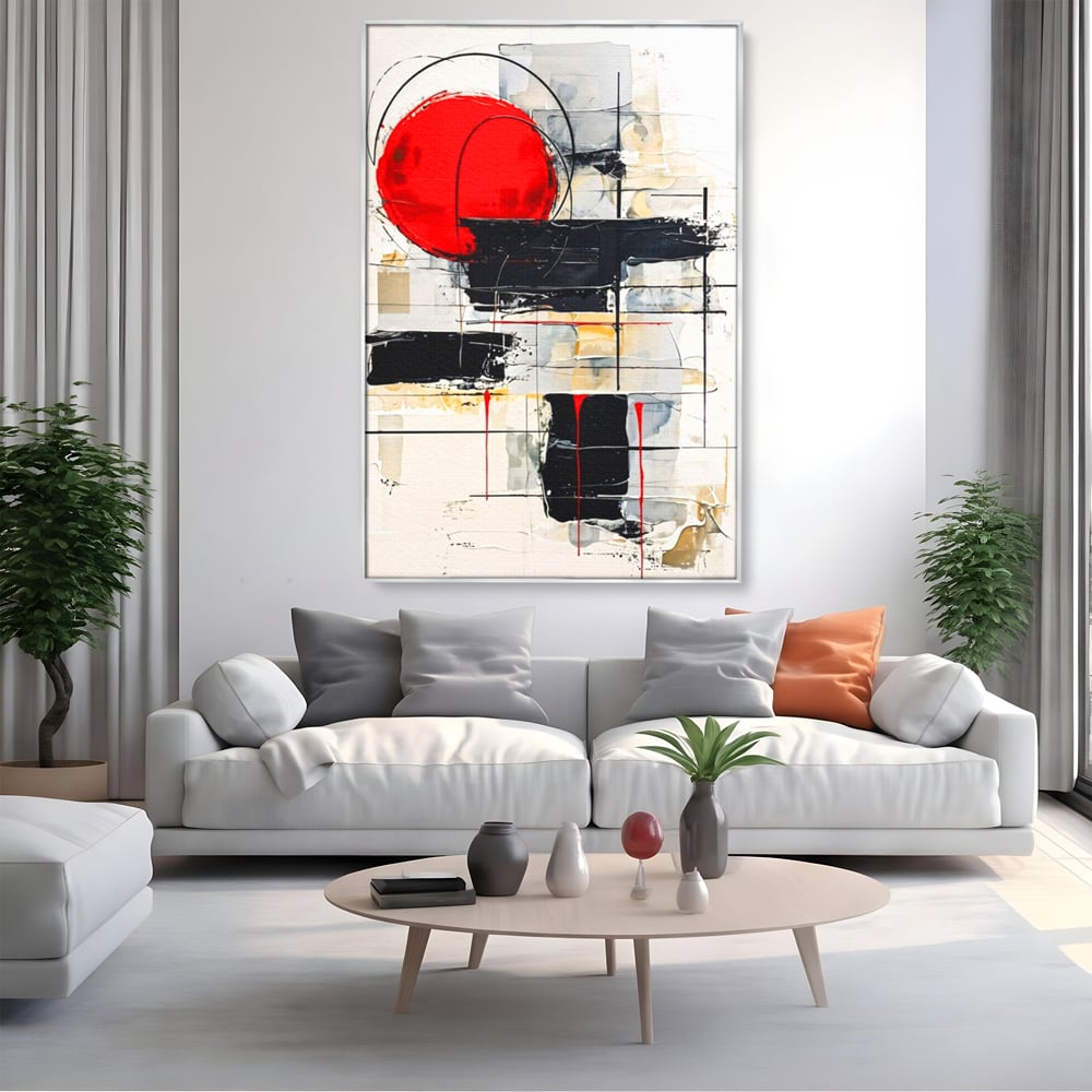 Tablou canvas cu tablou abstract cu cerc rosu si linii negre, in rama de aluminiu argintiu, pe perete intr-un living