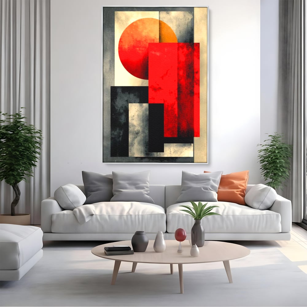 Tablou canvas cu tablou abstract geometric cu soare rosu, in rama de aluminiu argintiu, pe perete intr-un living