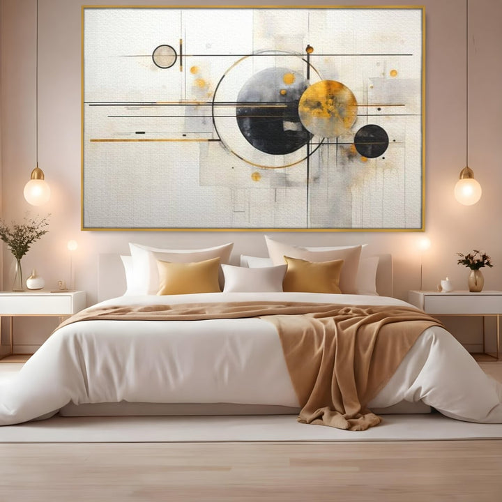 Tablou canvas cu pictura abstracta cu forme geometrice, in rama de aluminiu auriu, pe perete intr-un dormitor