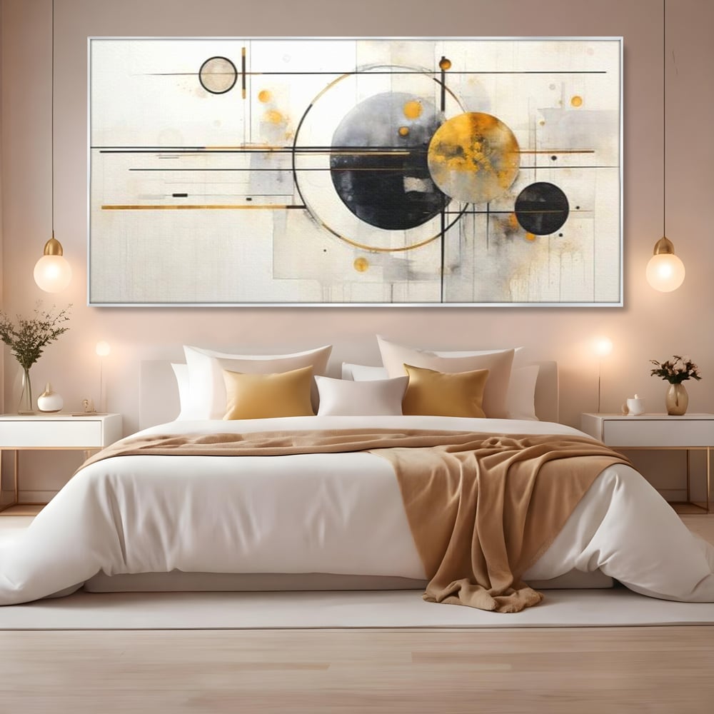 Tablou canvas cu pictura abstracta cu forme geometrice, in rama de aluminiu argintiu, pe perete intr-un dormitor