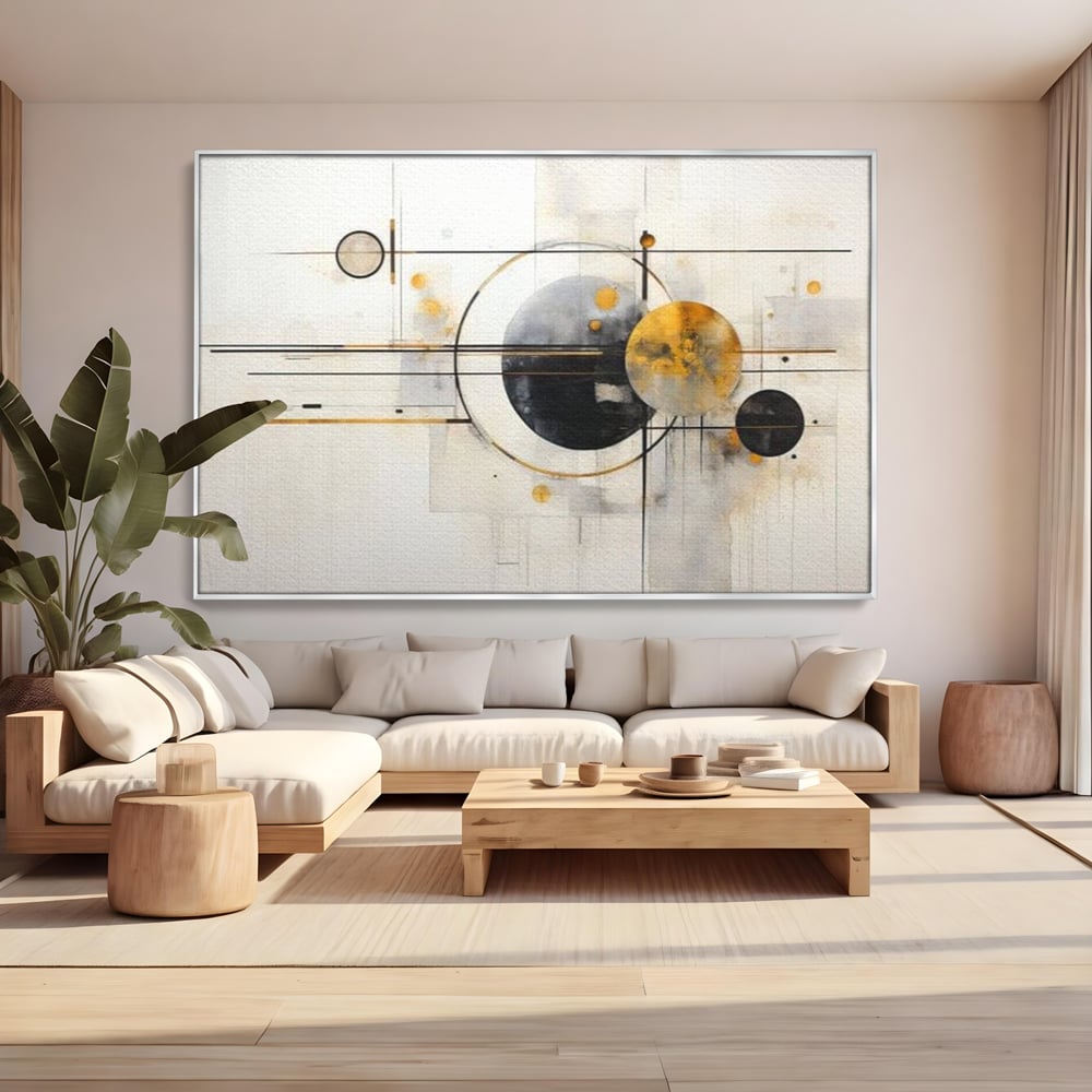 Tablou canvas cu pictura abstracta cu forme geometrice, in rama de aluminiu argintiu, pe perete intr-un living