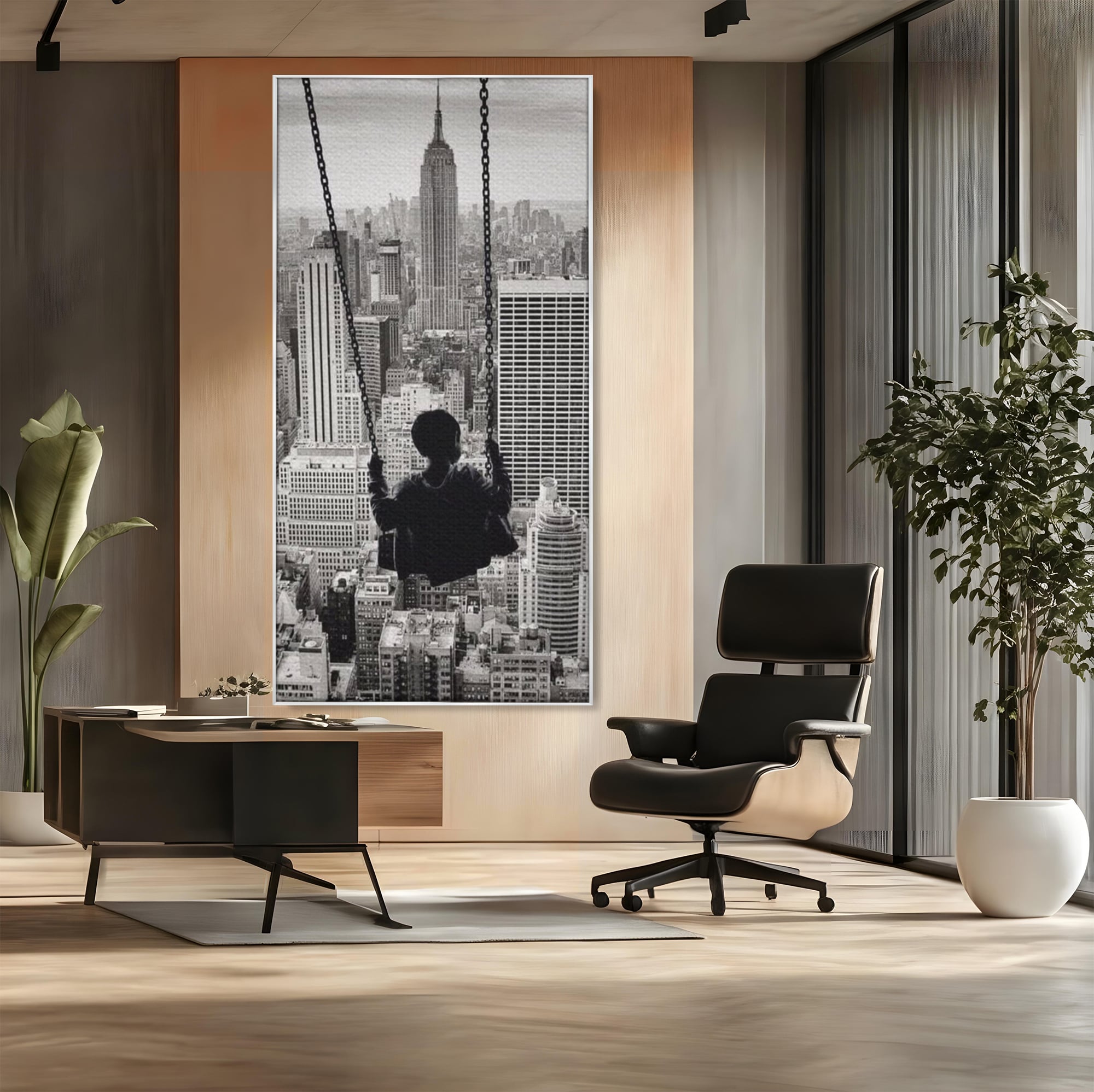 Tablou canvas cu tablou canvas cu copil in leagan deasupra orasului, in rama de aluminiu argintiu, pe perete intr-un birou