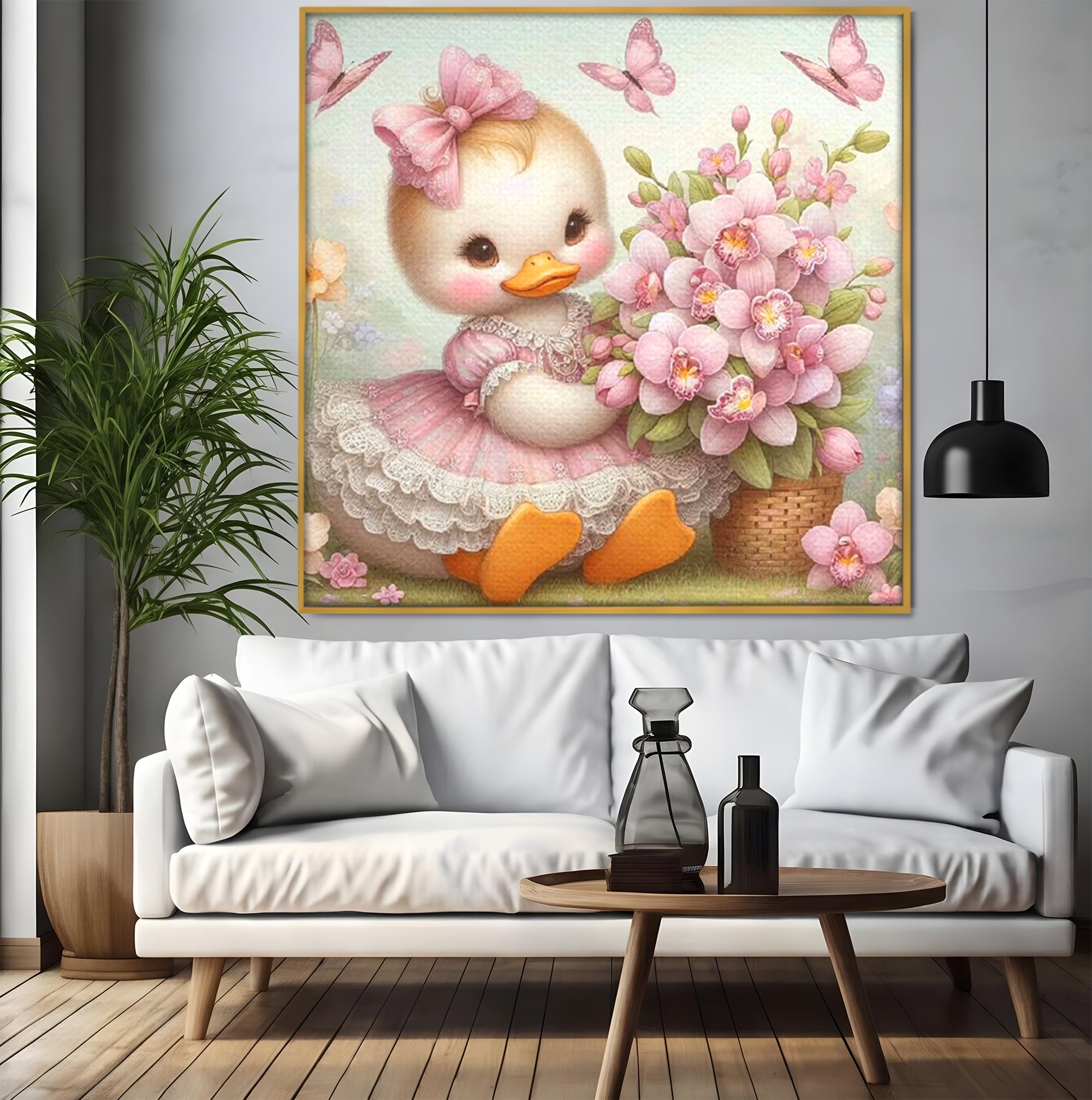 Tablou canvas cu ilustratie cu ratusca roz si fluturi, in rama de aluminiu auriu, pe perete intr-un living