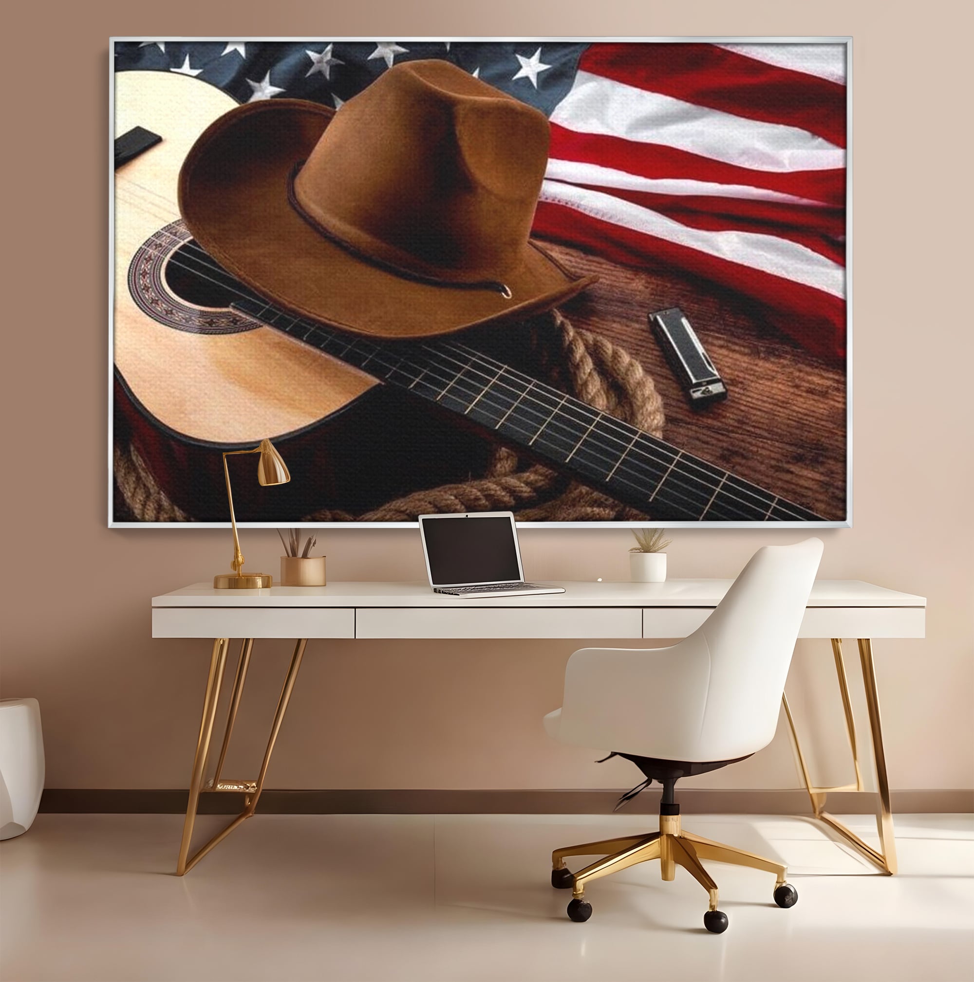 Tablou canvas cu tablou canvas cu palarie, chitara si drapel american, in rama de aluminiu argintiu, pe perete intr-un birou