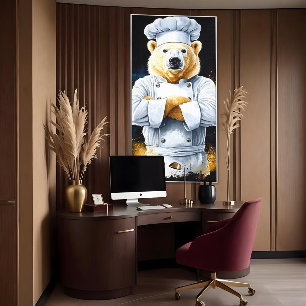 Tablou canvas cu ilustratie urs polar bucatar, in rama de aluminiu argintiu, pe perete intr-un birou