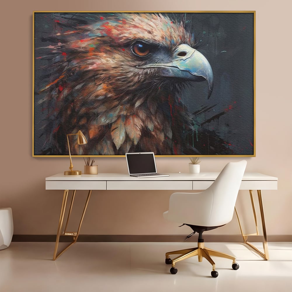 Tablou canvas cu tablou canvas cu vultur stilizat, in rama de aluminiu auriu, pe perete intr-un birou