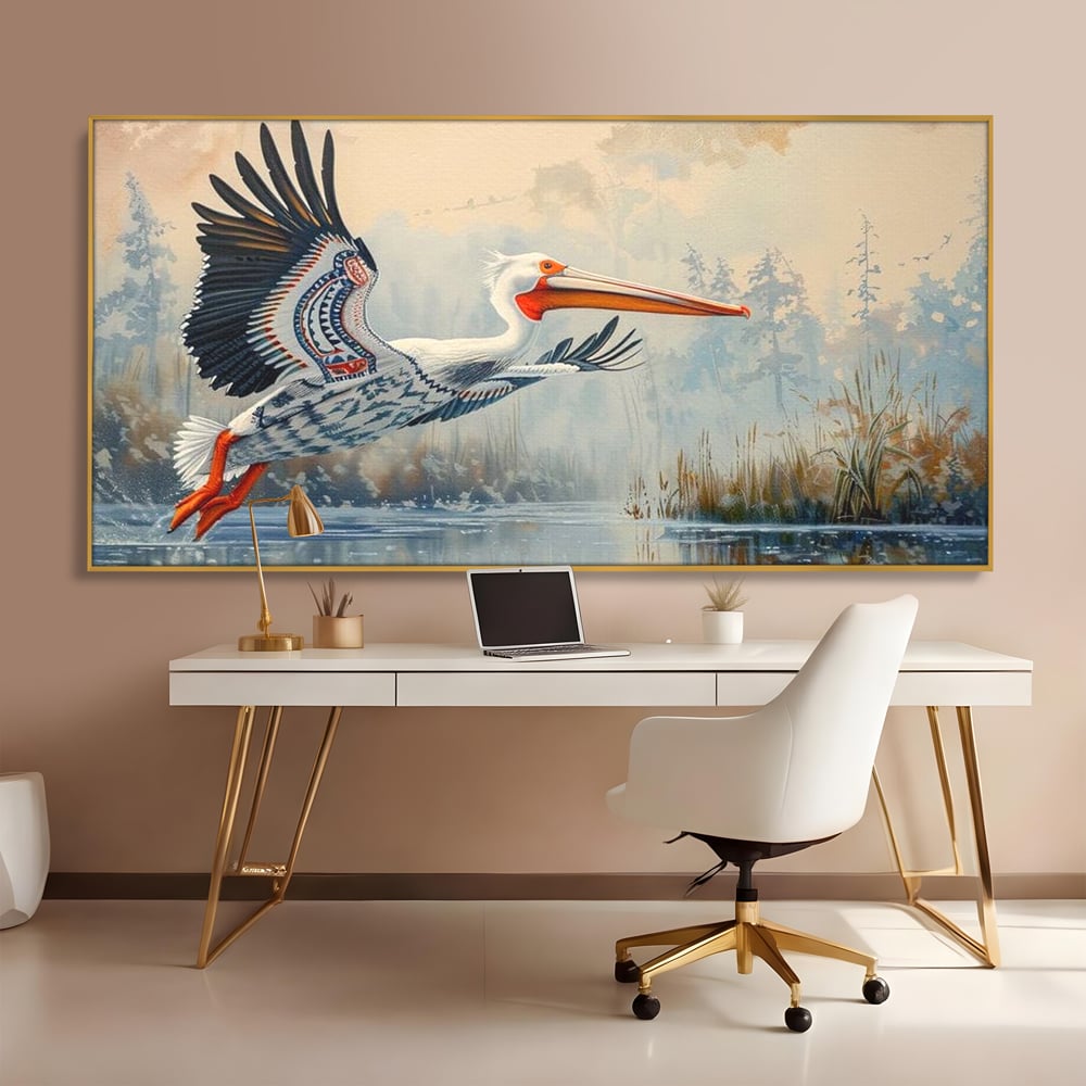 Tablou canvas cu tablou canvas cu pelican in zbor, in rama de aluminiu auriu, pe perete intr-un birou
