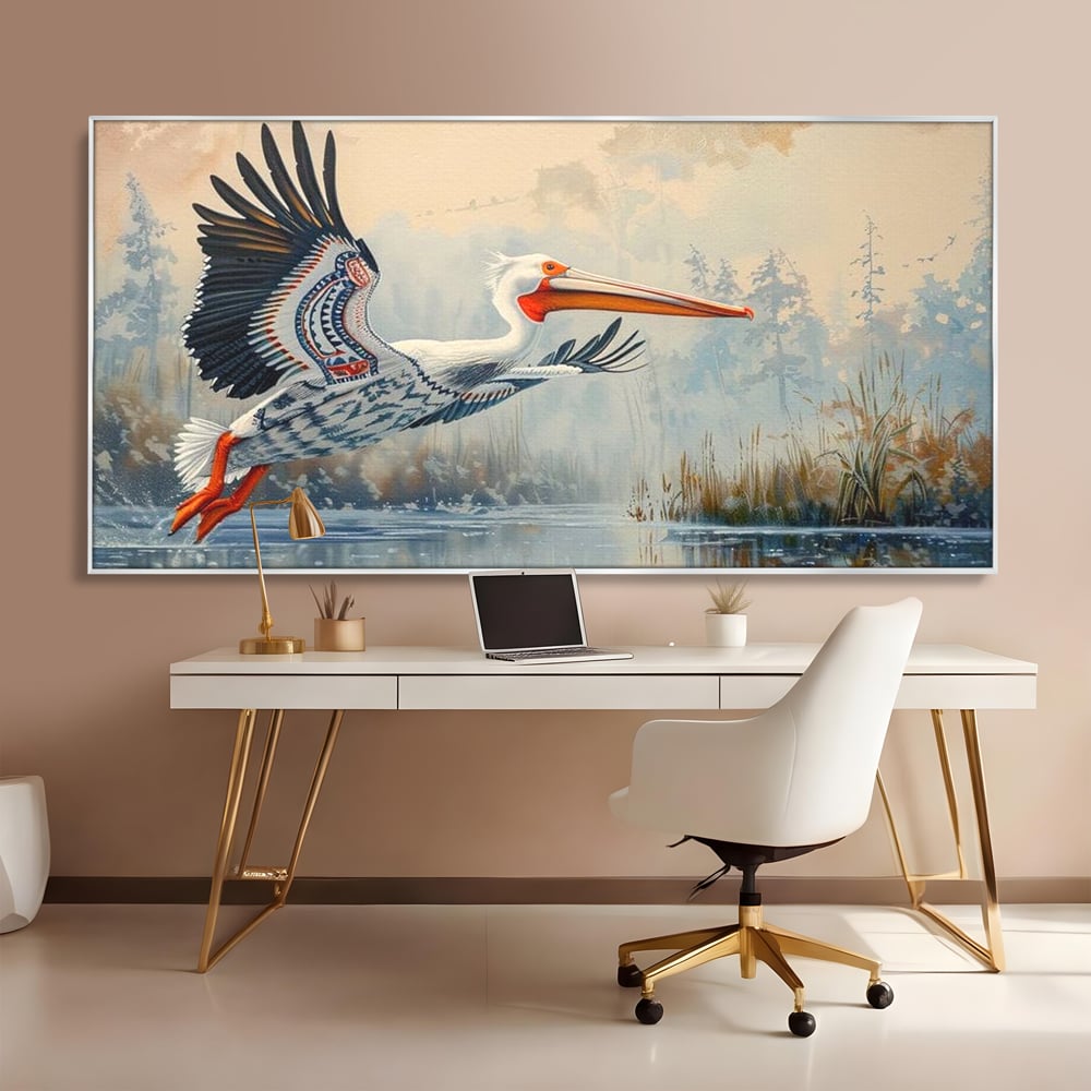 Tablou canvas cu tablou canvas cu pelican in zbor, in rama de aluminiu argintiu, pe perete intr-un birou