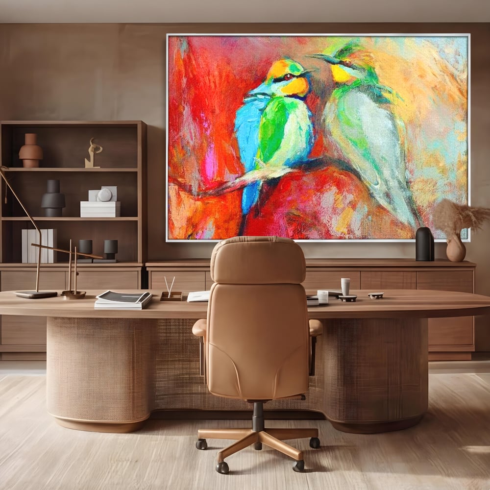 Tablou canvas cu tablou canvas cu doua pasari colorate pe creanga, in rama de aluminiu argintiu, pe perete intr-un birou