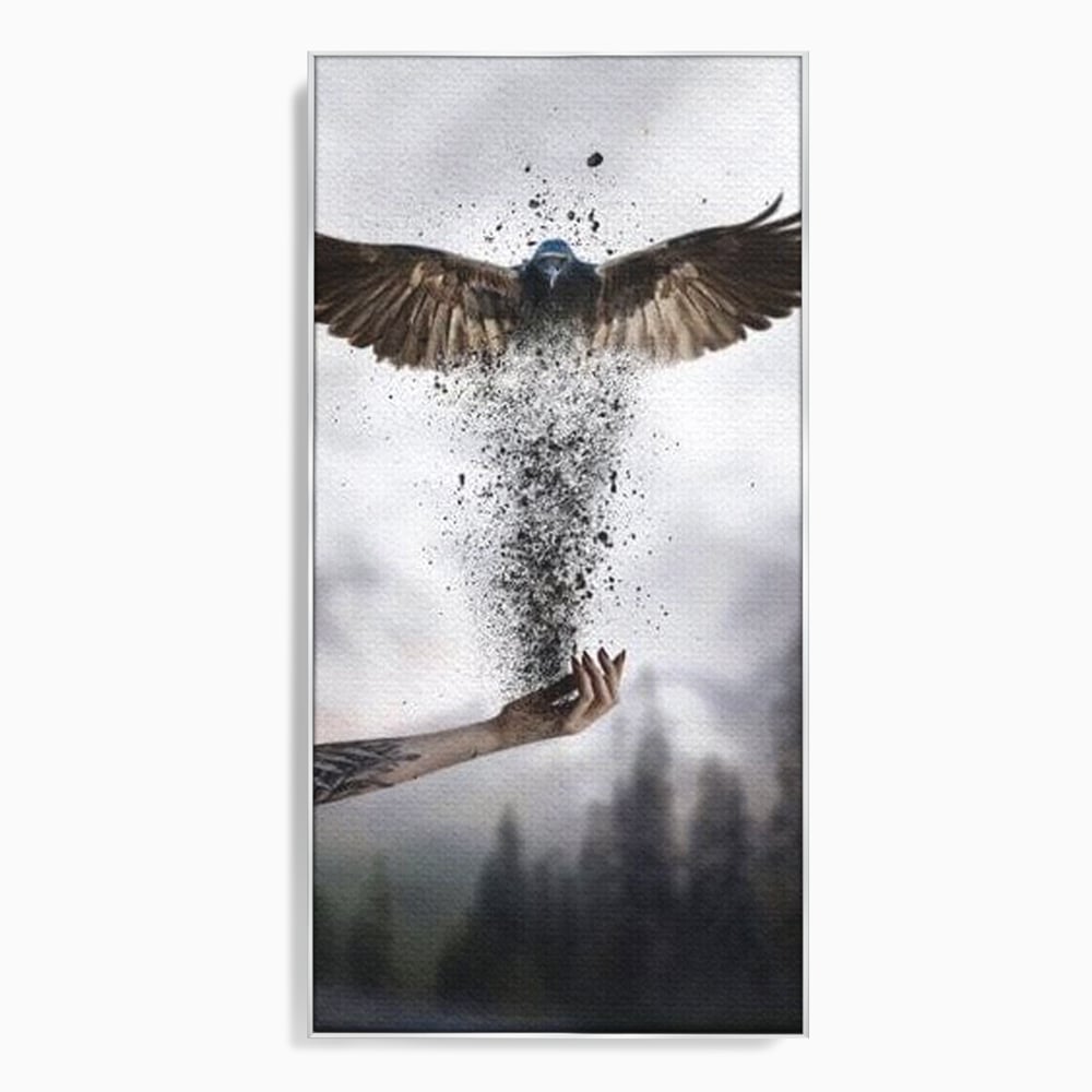 Tablou canvas cu tablou canvas cu pasare si mana din cenusa, in rama de aluminiu argintiu