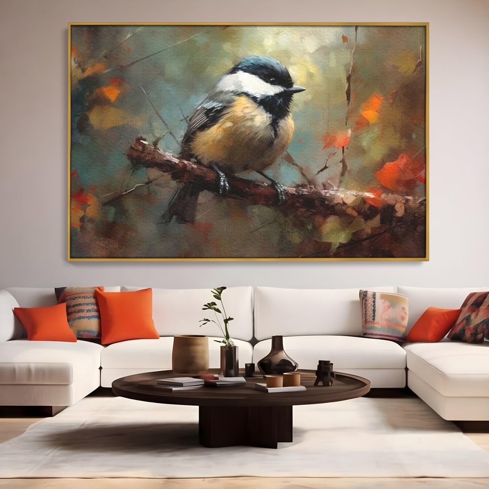 Tablou canvas cu tablou canvas cu pitigoi pe creanga, in rama de aluminiu auriu, pe perete intr-un living