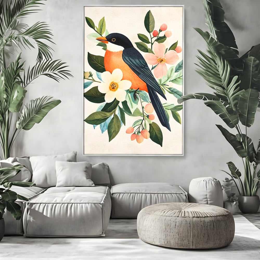 Tablou canvas cu tablou canvas cu pasare portocalie si flori, in rama de aluminiu argintiu, pe perete intr-un living