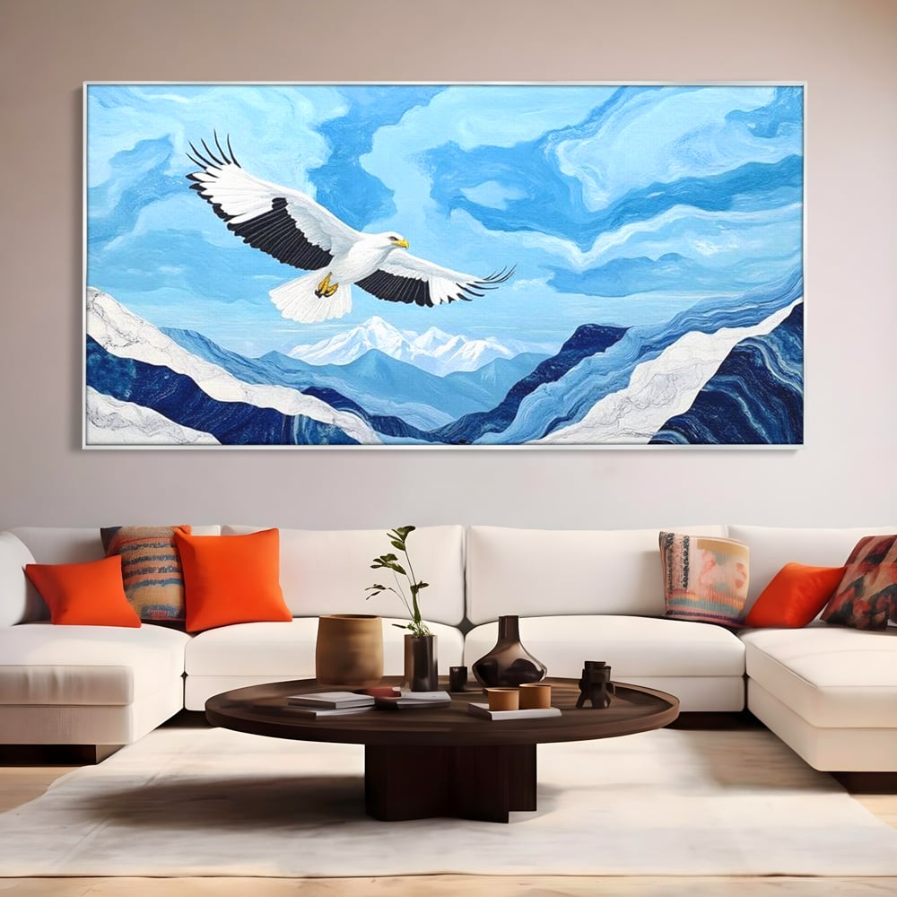 Tablou canvas cu tablou canvas cu vultur in zbor peste munti, in rama de aluminiu argintiu, pe perete intr-un living