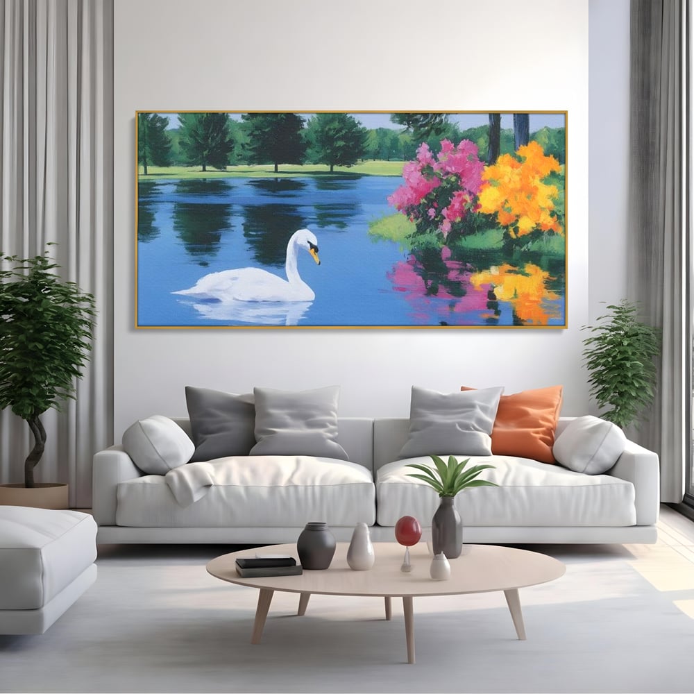 Tablou canvas cu pictura cu lebada pe lac si flori, in rama de aluminiu auriu, pe perete intr-un living