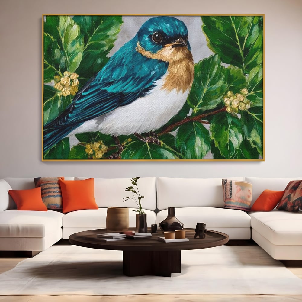 Tablou canvas cu tablou canvas cu pasare albastra printre frunze, in rama de aluminiu auriu, pe perete intr-un living