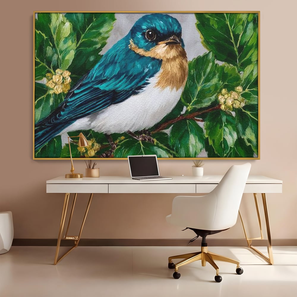 Tablou canvas cu tablou canvas cu pasare albastra printre frunze, in rama de aluminiu auriu, pe perete intr-un birou