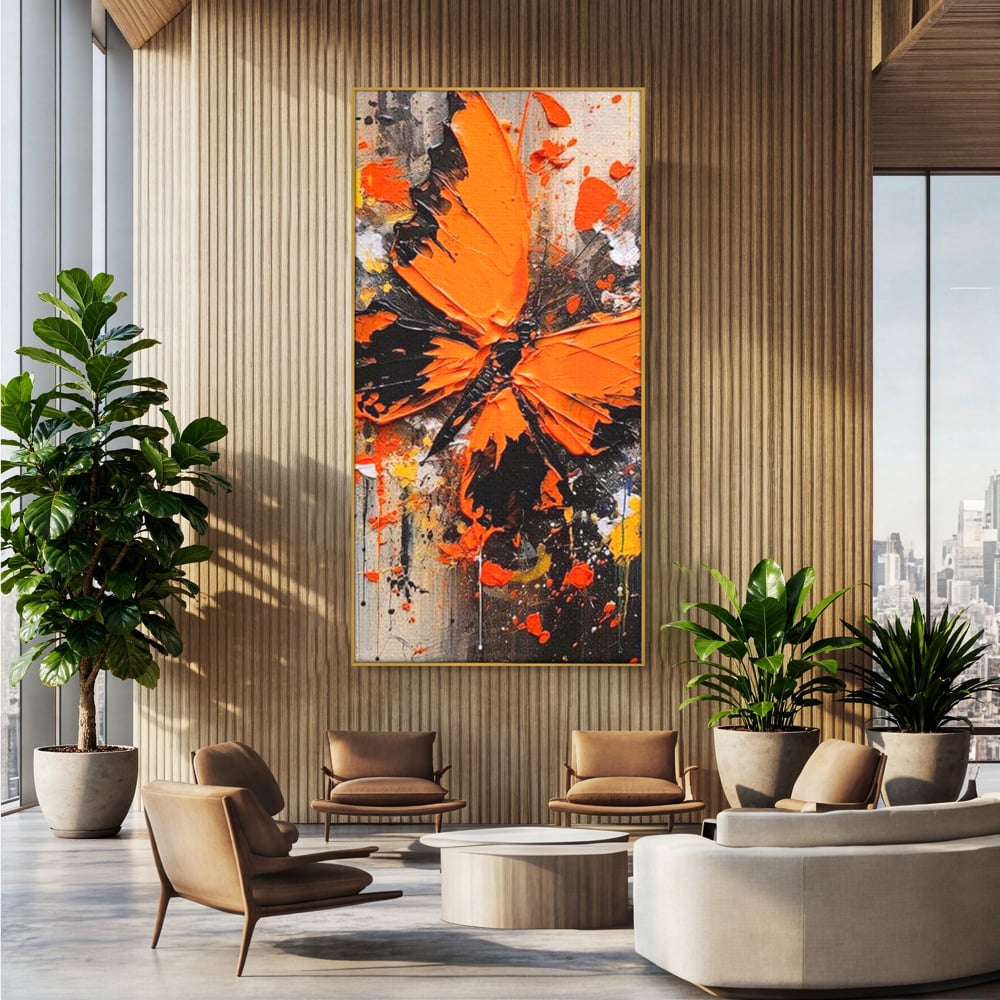 Tablou canvas cu tablou canvas cu fluture portocaliu pe fundal antracit, in rama de aluminiu auriu, pe perete intr-un birou