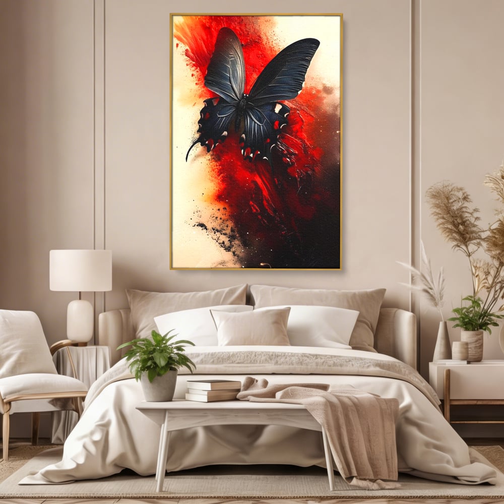 Tablou canvas cu tablou canvas cu fluture negru si fundal rosu, in rama de aluminiu auriu, pe perete intr-un dormitor