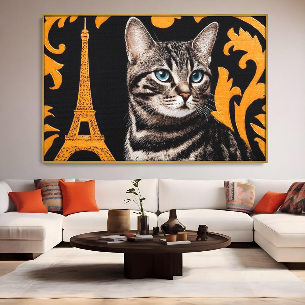 Tablou canvas cu tablou canvas cu pisica si turnul eiffel, in rama de aluminiu auriu, pe perete intr-un living