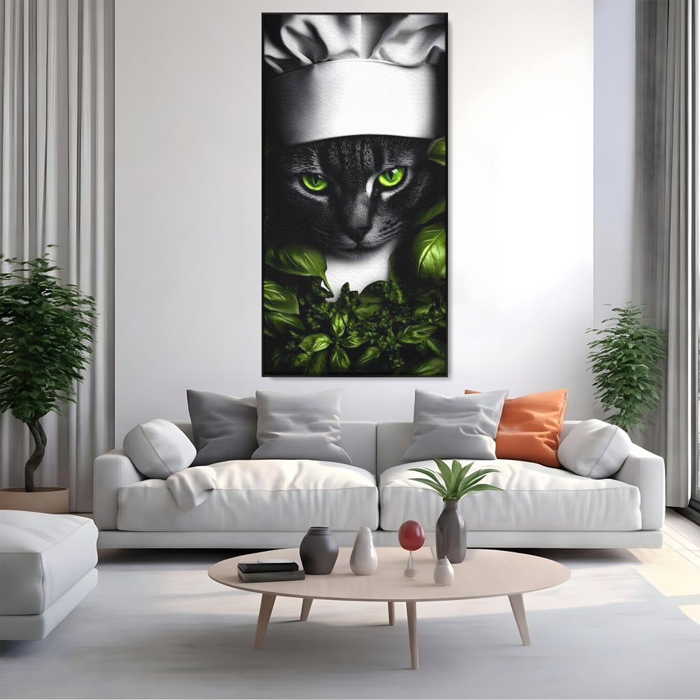 Tablou canvas cu tablou canvas cu pisica bucatar si frunze, in rama de aluminiu negru, pe perete intr-un living