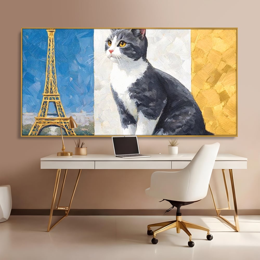 Tablou canvas cu tablou canvas cu pisica si turnul eiffel, in rama de aluminiu auriu, pe perete intr-un birou