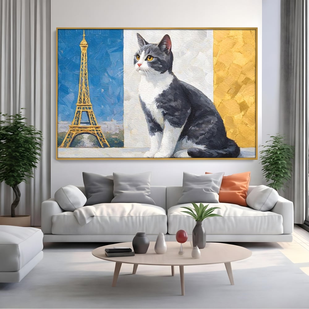 Tablou canvas cu tablou canvas cu pisica si turnul eiffel, in rama de aluminiu auriu, pe perete intr-un living