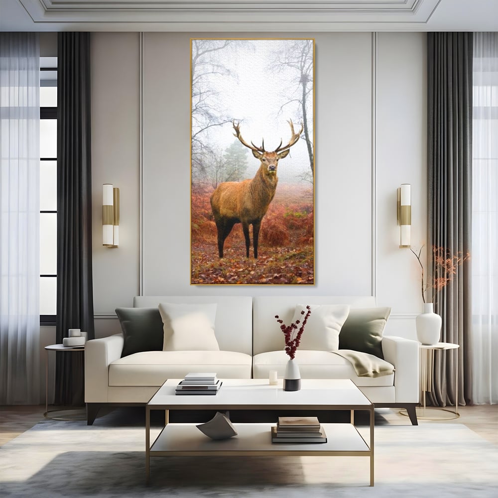 Tablou canvas cu tablou canvas cu cerb in padure cu ceata, in rama de aluminiu auriu, pe perete intr-un living