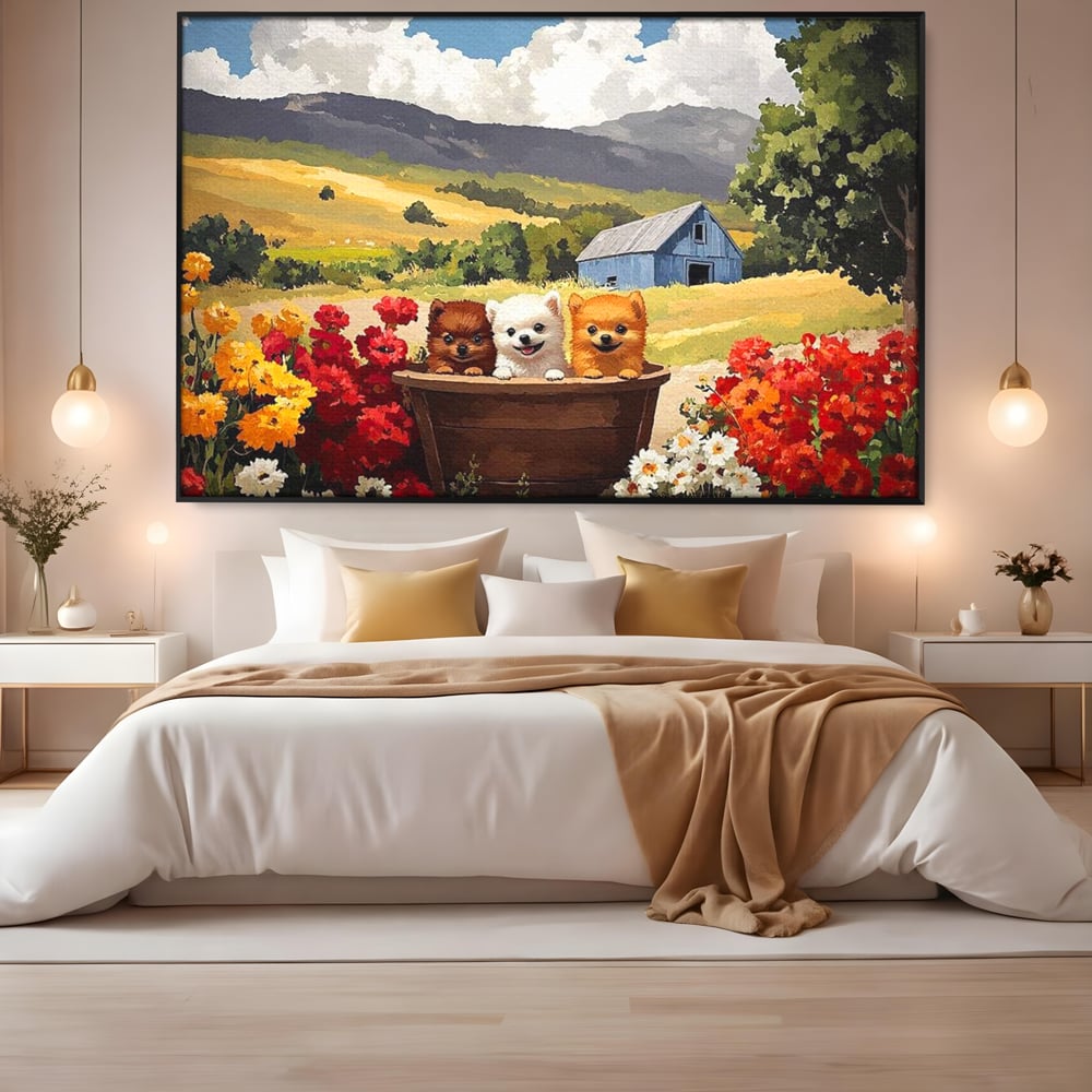 Tablou canvas cu pictura cu trei catelusi in butoi, in rama de aluminiu negru, pe perete intr-un dormitor