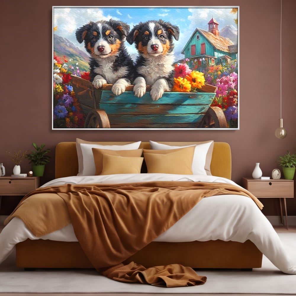 Tablou canvas cu doi catei australian shepherd in caruta cu flori, in rama de aluminiu argintiu, pe perete intr-un dormitor