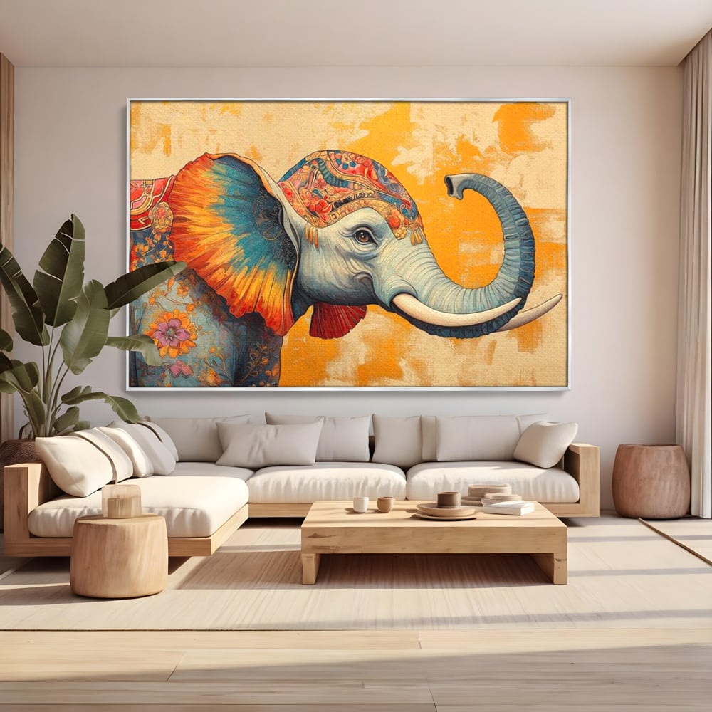 Tablou canvas cu tablou canvas cu elefant decorat in stil oriental, in rama de aluminiu argintiu, pe perete intr-un living