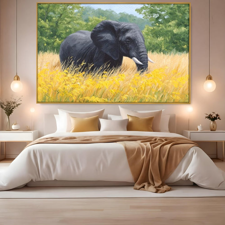 Tablou canvas cu pictura cu elefant pe pajiste, in rama de aluminiu auriu, pe perete intr-un dormitor