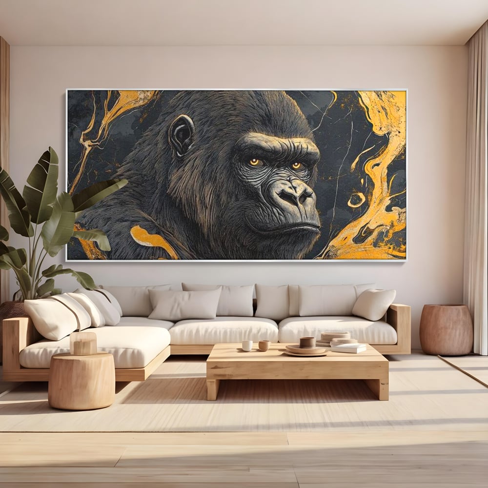 Tablou canvas cu tablou canvas cu gorila si detalii aurii, in rama de aluminiu argintiu, pe perete intr-un living