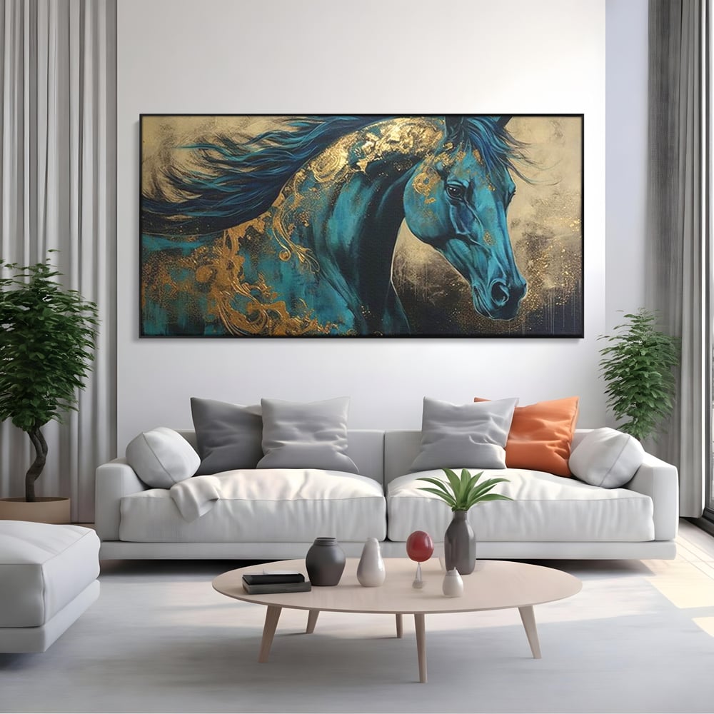 Tablou canvas cu tablou canvas cu cal albastru si auriu, in rama de aluminiu negru, pe perete intr-un living
