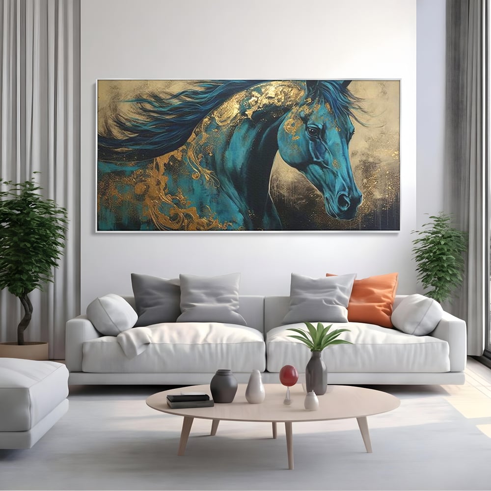Tablou canvas cu tablou canvas cu cal albastru si auriu, in rama de aluminiu argintiu, pe perete intr-un living