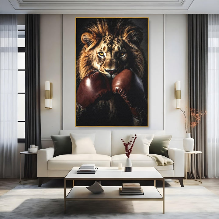 Tablou canvas cu tablou canvas cu leu si manusi de box, in rama de aluminiu auriu, pe perete intr-un living