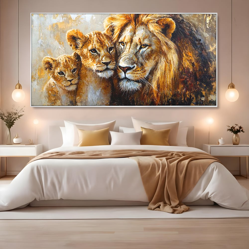 Tablou canvas cu tablou cu leu adult si doi pui, in rama de aluminiu argintiu, pe perete intr-un dormitor