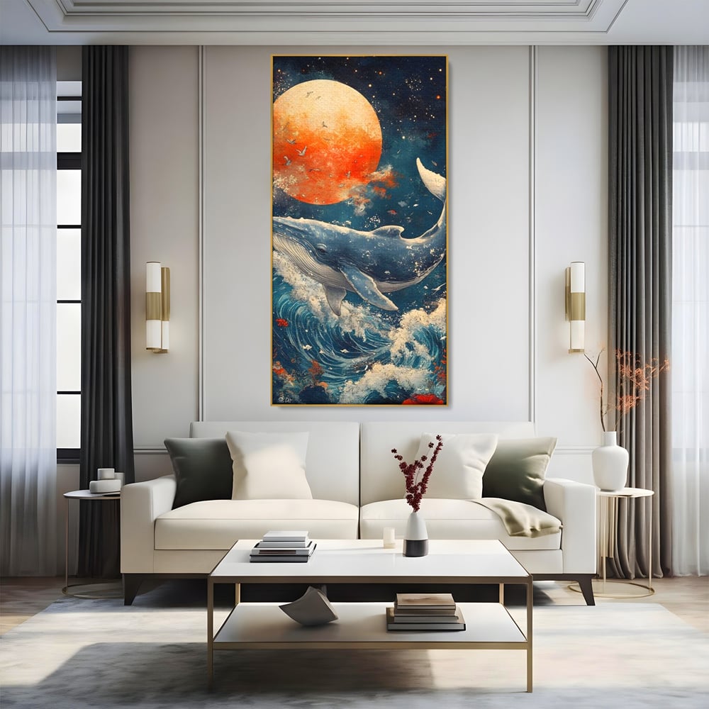 Tablou canvas cu tablou canvas cu balena si luna, in rama de aluminiu auriu, pe perete intr-un living