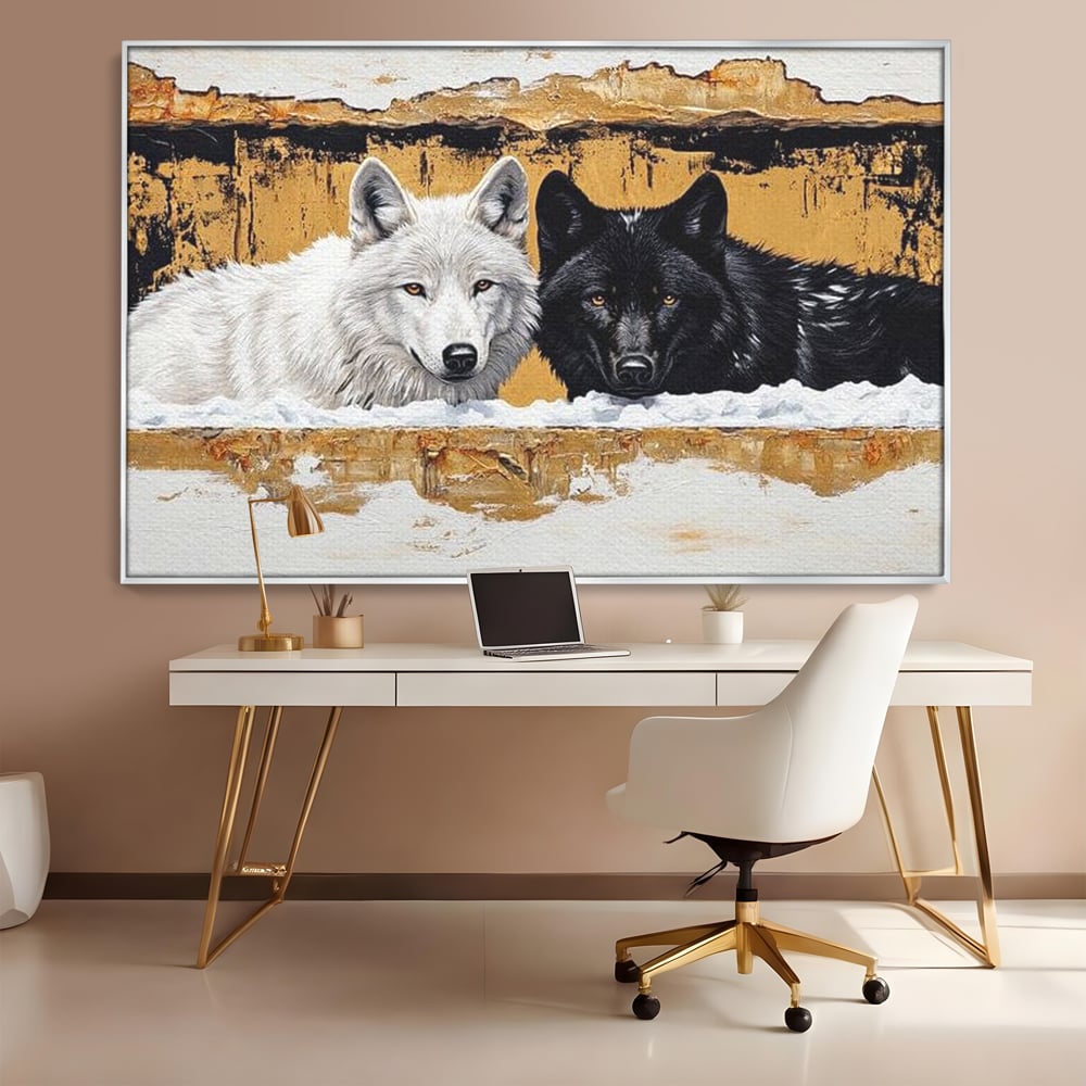 Tablou canvas cu pictura cu doi lupi in zapada, in rama de aluminiu argintiu, pe perete intr-un birou