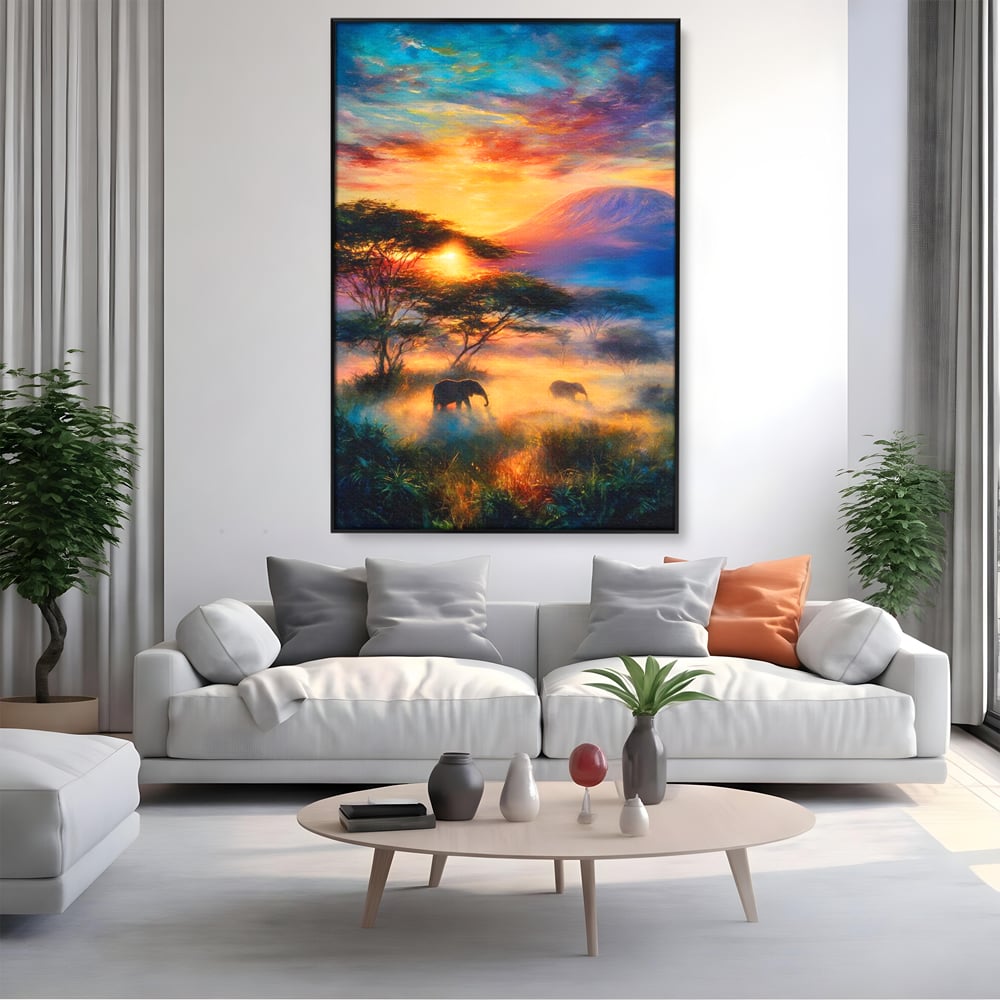 Tablou canvas cu tablou canvas cu elefanti la apus, in rama de aluminiu negru, pe perete intr-un living