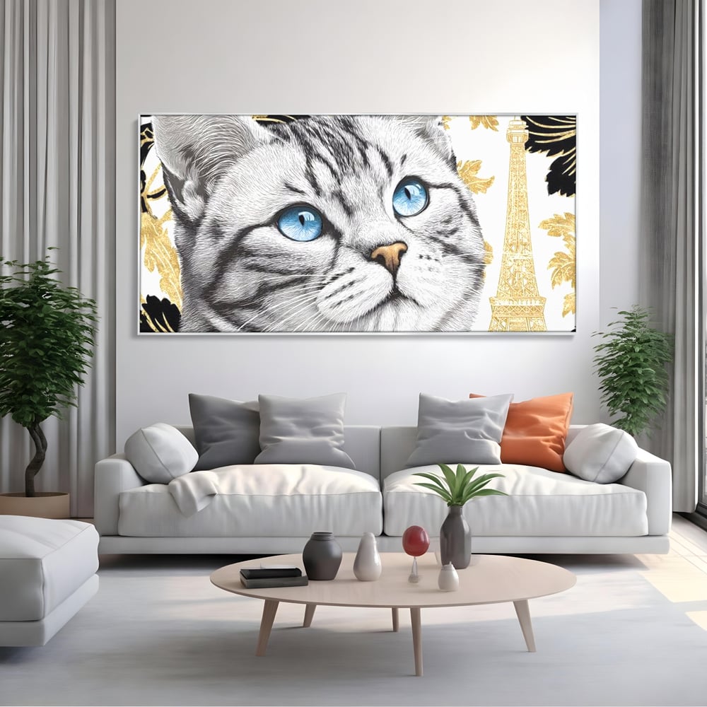 Tablou canvas cu tablou canvas cu pisica si turnul eiffel, in rama de aluminiu argintiu, pe perete intr-un living